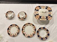 Full set laid out showing all nine pieces and pattern