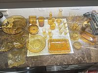 Overhead view of entire amber glass lot on countertop