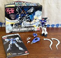 Box front, assembled model, manual and accessories displayed