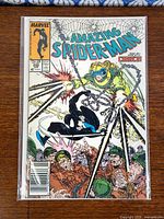 Front cover of The Amazing Spider-Man #299 in bag with board