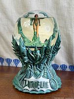 Full view of Witchblade snow globe showing base and figurine