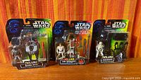 Front view of all three sealed Deluxe figures: Boba Fett, Luke Skywalker, Snowtrooper