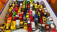Full tray filled with assorted diecast vehicles