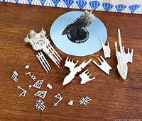 group shot of painted ship and loose parts