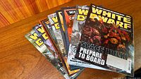 Front view fanned White Dwarf magazines showing cover art and titles
