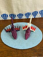 Top view of both painted Eldar Eclipse Cruiser miniatures