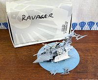 Ravager model on blue mat with original box behind