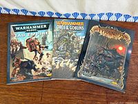 Front covers of all three codex books