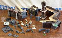 Overview of all terrain pieces, figures, weapons and accessories on table