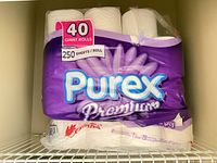 Purex Premium toilet paper pack in cabinet