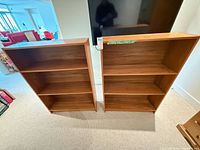 Front view of both bookcases side by side