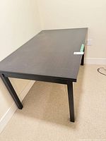 Full view of dark brown dining table