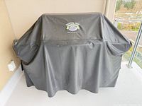 Grill covered with black Capital Iron cover