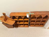 Overall view showing both cubby shelves, tapered bin and bracket