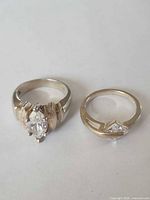 Two sterling silver rings side by side