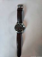 Full view of Fossil watch with leather band