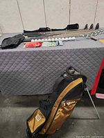 Full lot showing clubs, accessories and Wilson bag