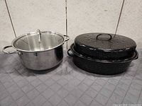 Roasting pan and stock pot side by side for scale