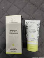 Front view of boxed and tubed Drunk Elephant Wonderwild Miracle Butter 60 ml