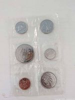 Six-coin set reverse sides in sealed plastic