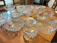 Group overview of all clear glass pieces on table