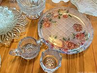 Group shot of assorted glass pieces on table
