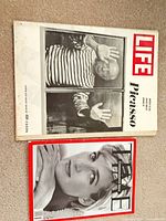 Cover view of both magazines