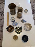 Overhead view of all pottery items with ruler for scale