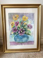 Front view of framed watercolor floral painting