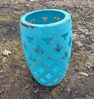 Full view of barrel showing shape, color, cutouts and rust spots