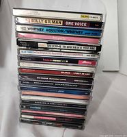 Vertical stack showing CD spine titles, about 18-20 discs