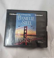 Front of audiobook case with title and cover art