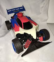 Front three-quarter view showing body, suspension and wheels