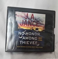 Front of plastic binder case showing title, author, reader