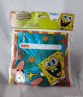 Front view of sealed package showing SpongeBob SquarePants graphics and count of 8 bags