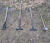 All four long-handled tools laid out