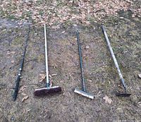 all four tools laid out on ground
