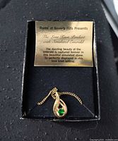 Necklace in box with presentation card front view