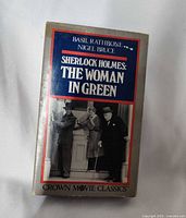 Front of slipcase showing title, actors and artwork