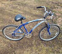 Right side profile of blue/silver Huffy bike