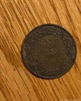 Reverse side showing denomination and date