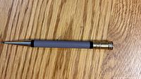 Full view of Parker Duofold mechanical pencil showing grey barrel, metal tip, and gold-filled cap end