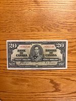 Obverse of 1937 $20 bill showing King George VI portrait and serial number