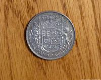 Reverse side with Canadian coat of arms