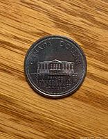 Reverse of 1973 Canada PEI dollar showing Province House design