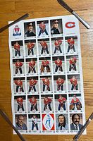 Front of uncut sheet showing colour player photos and team logos