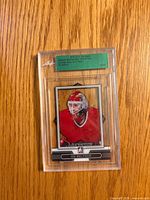Front of encased Ed Belfour silver parallel card showing player image and design