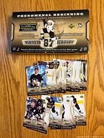 Display box and spread of all 20 Sidney Crosby Phenomenal Beginning cards