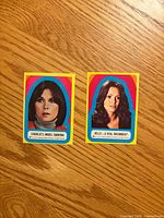 Front view of both Charlie’s Angels stickers showing portraits and captions