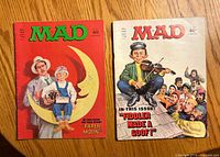 Front covers of both Mad magazines showing issue numbers and artwork